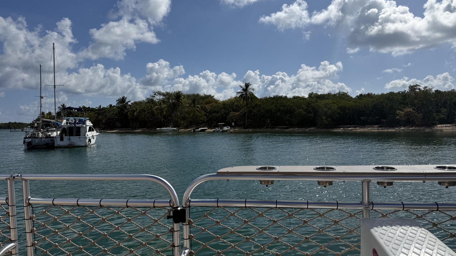 Pontoon boat on the water during a Raccoon Island wildlife tour, South Florida near Fort Lauderdale